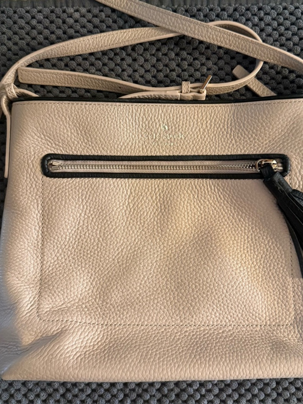 kate spade Pebbled Leather Crossbody in Light Beige with Black Tassel